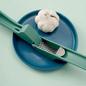 Household stainless steel no skin pressure garlic grinder, manual garlic mash grinder, kitchen multifunctional garlic squeezing tool
